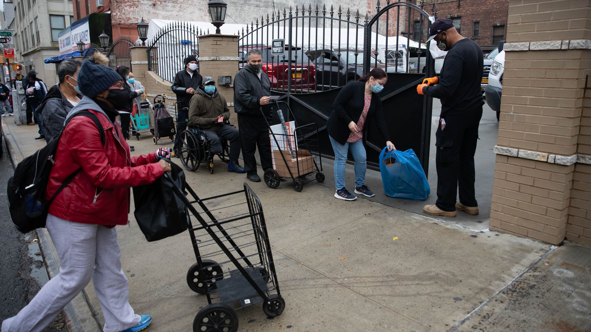 People in line outside a food pantry in Brooklyn, New York, in November 2020.