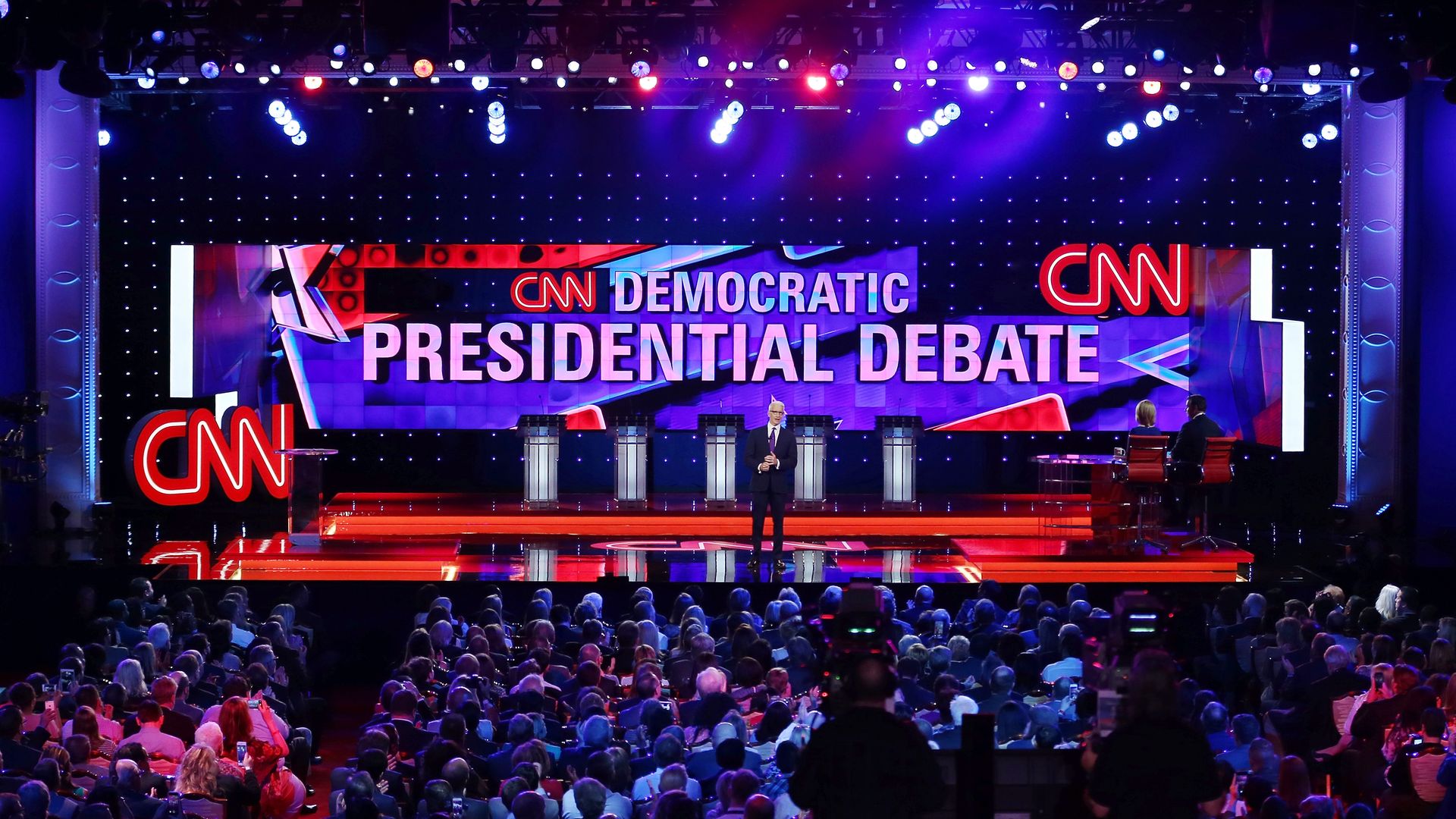 CNN anchor Anderson Cooper prepares to moderate a CNN-sponsored Democratic presidential debate in Las Vegas, Nevada in 2015. 