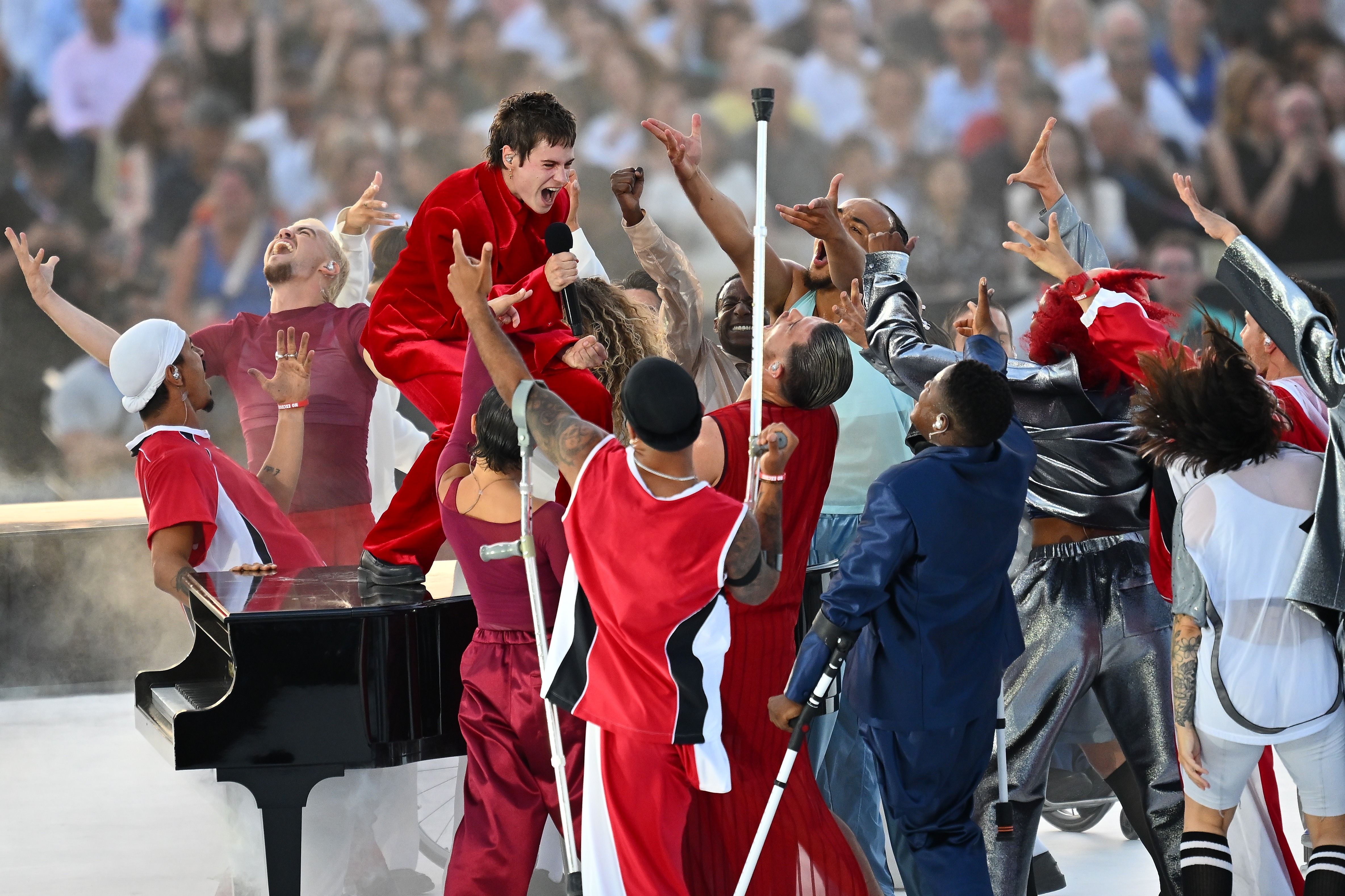 Christine and the Queens performs during the opening ceremony of the Paris 2024 Summer Paralympic Games at Place de la Concorde on August 28, 2024 in Paris, France.