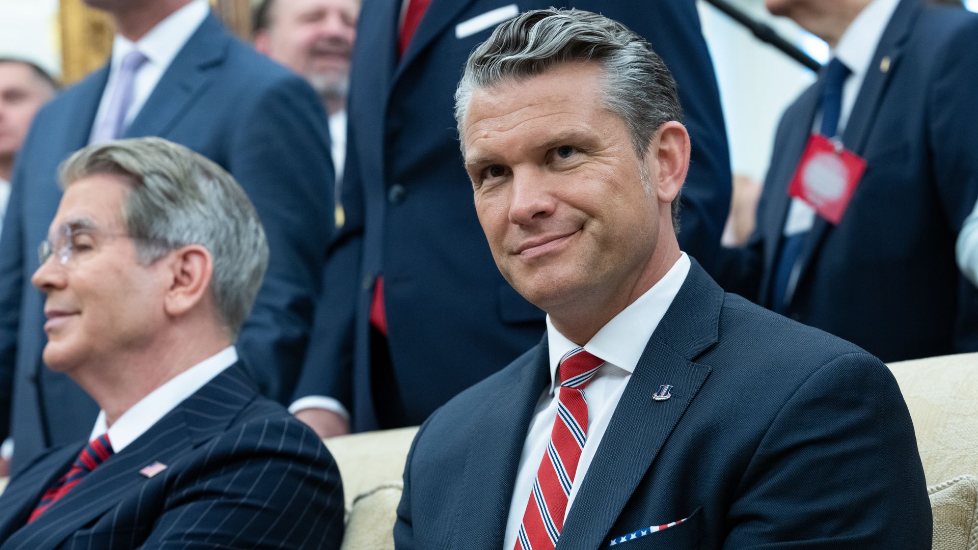 Defense Secretary Pete Hegseth sit in the Oval Office during a meeting between the U.S. and Lebanese presidents.