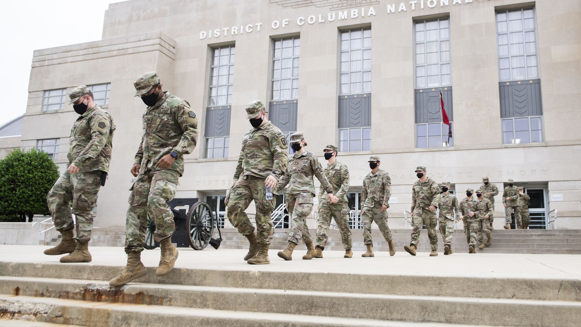 National Guard troops make their way to buses outside the D.C. Armory after ending their mission in Washington on Monday, May 24, 2021.