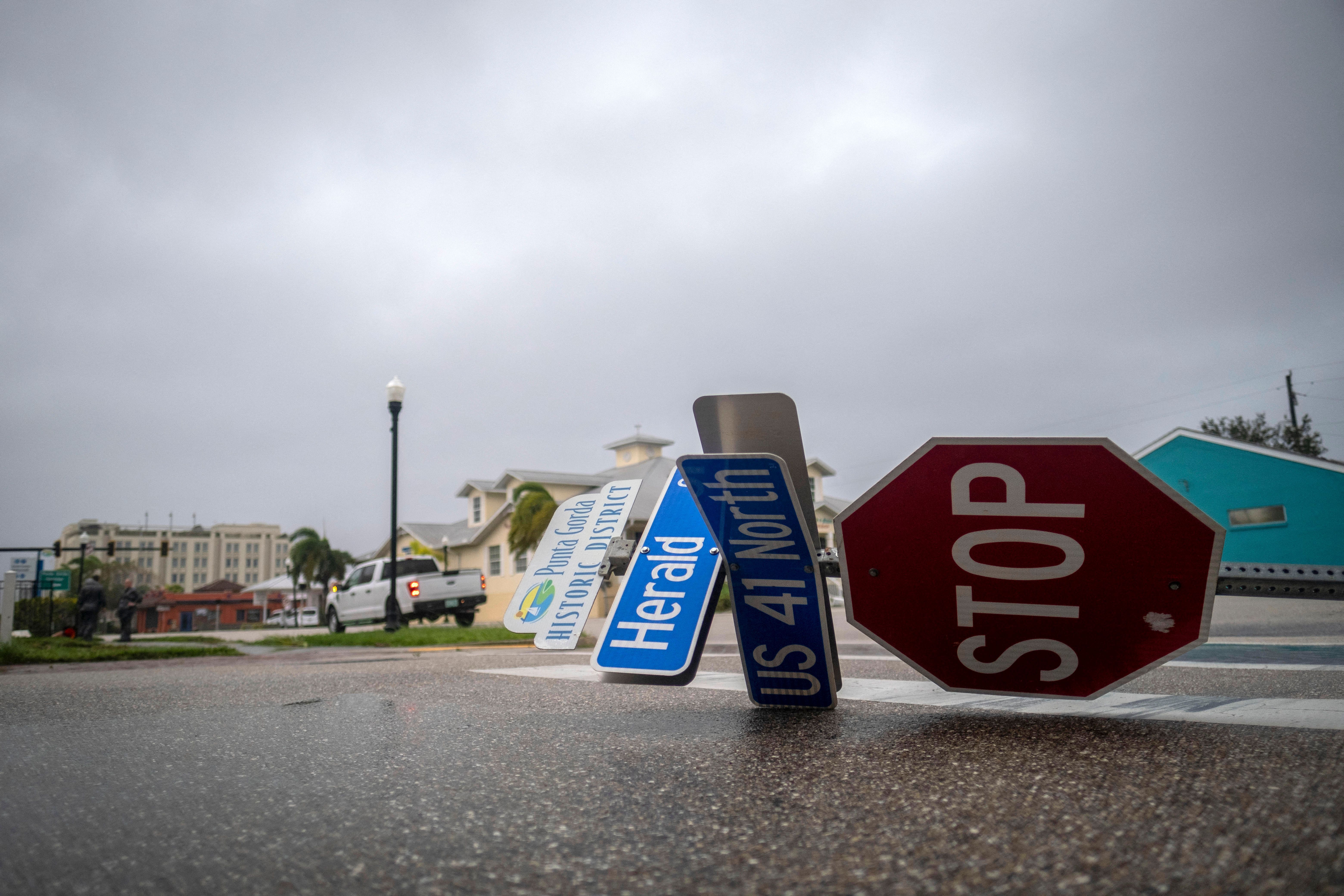 A blown down street sign is seen as the eye of Hurricane Ian passes by in Punta Gorda, Florida on September 28.