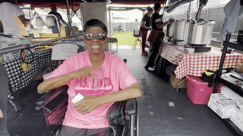 Image shows Ms. Linda waving.