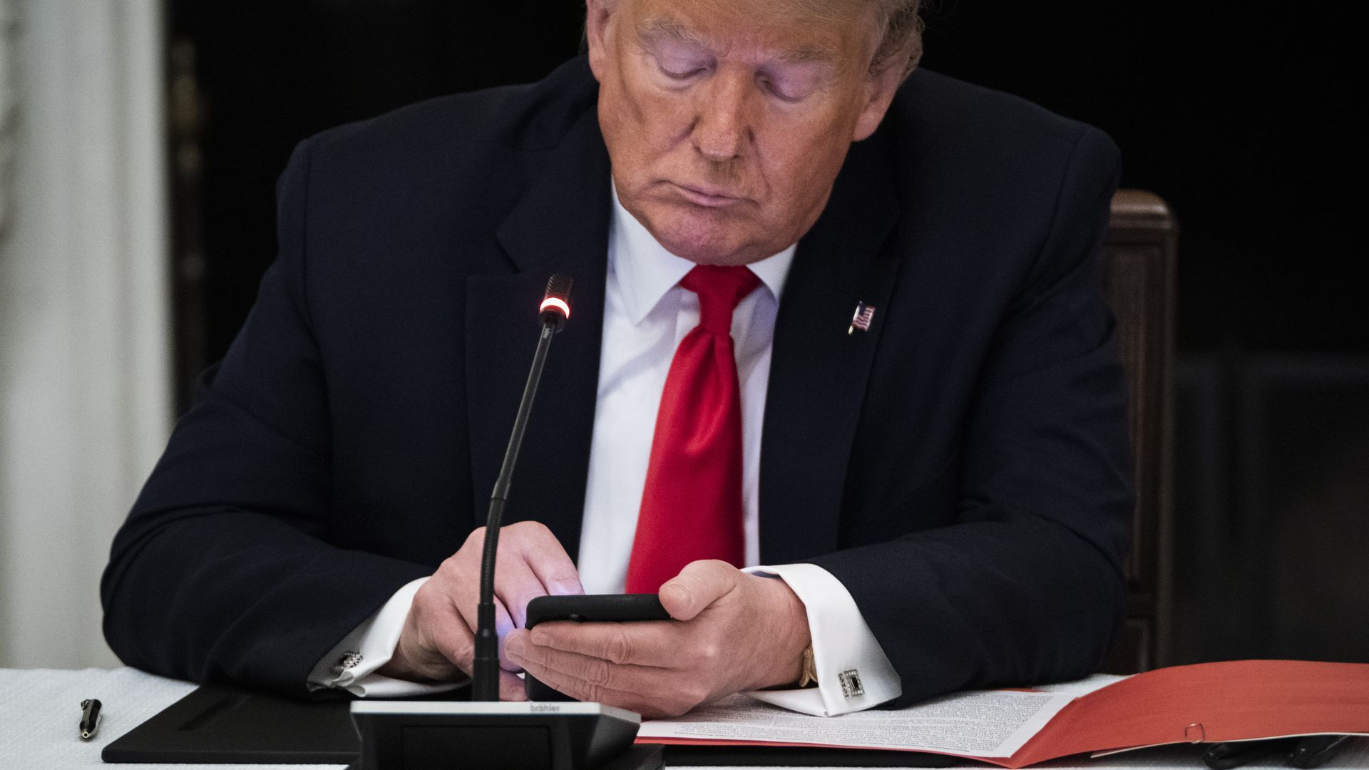 Donald Trump on his phone