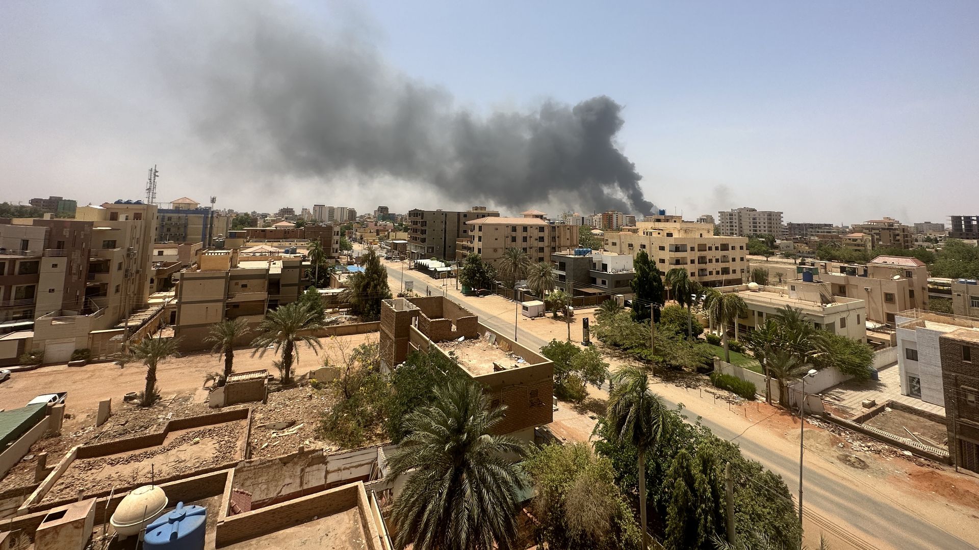  Smokes rise after clashes erupted in the Sudanese capital on April 15, 2023 between the Sudanese Armed Forces and the paramilitary Rapid Support Forces (RSF). 