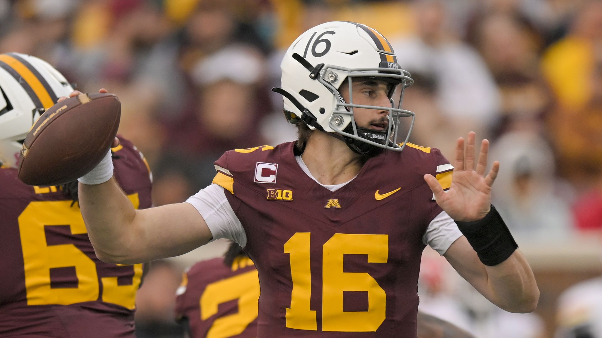 A photo of Max Brosmer throwing a football