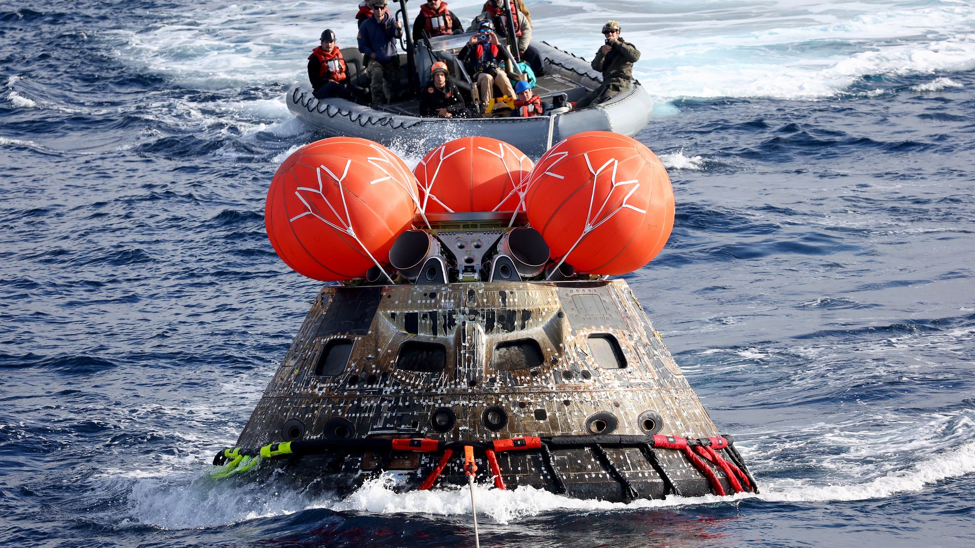 NASA's Orion Capsule is drawn to the well deck of the U.S.S. Portland.