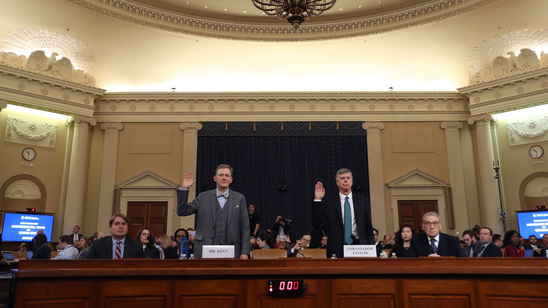 George Kent (left) and Bill Taylor (right) swearing an oath.