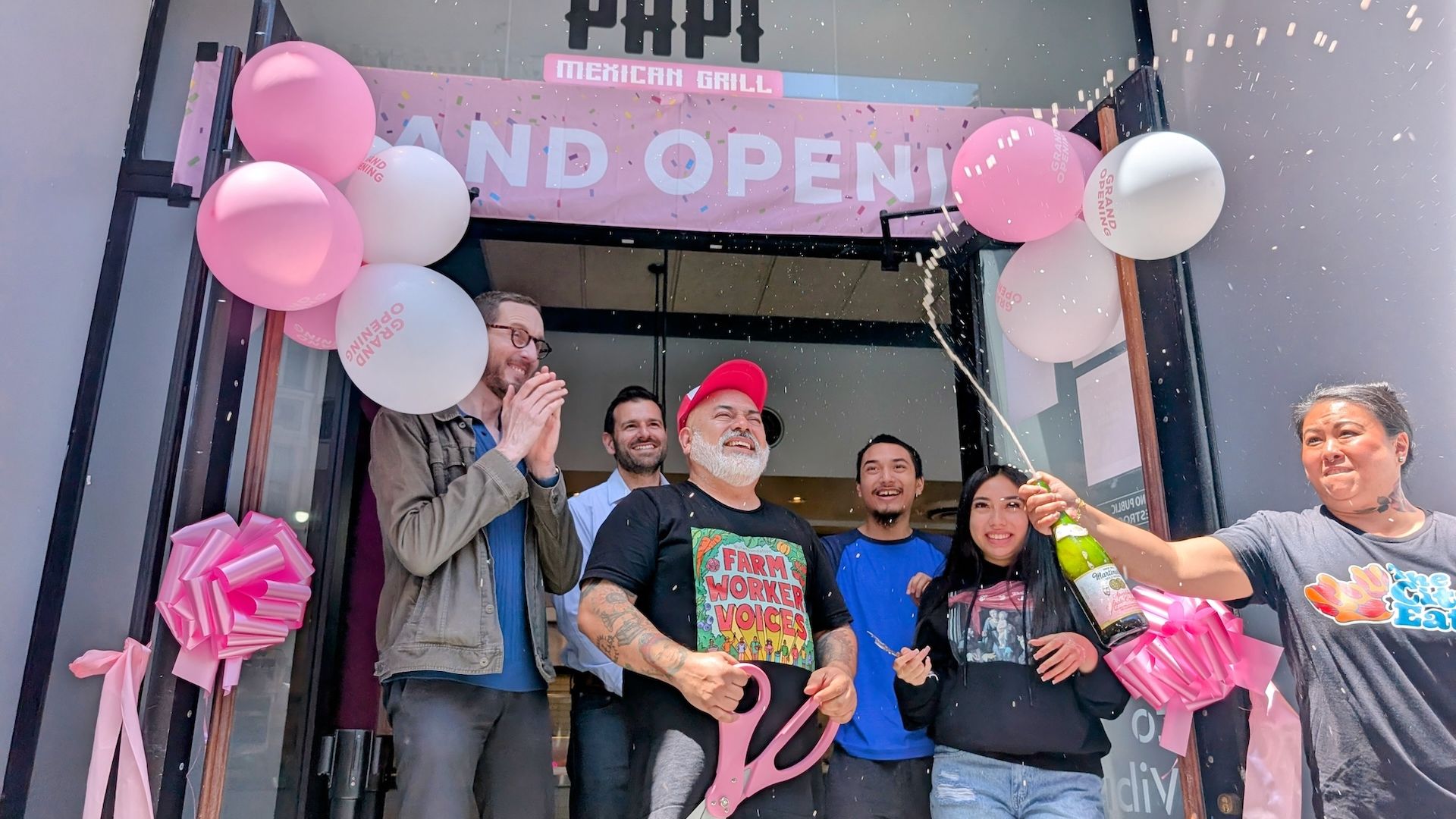 A small business celebrating an opening.