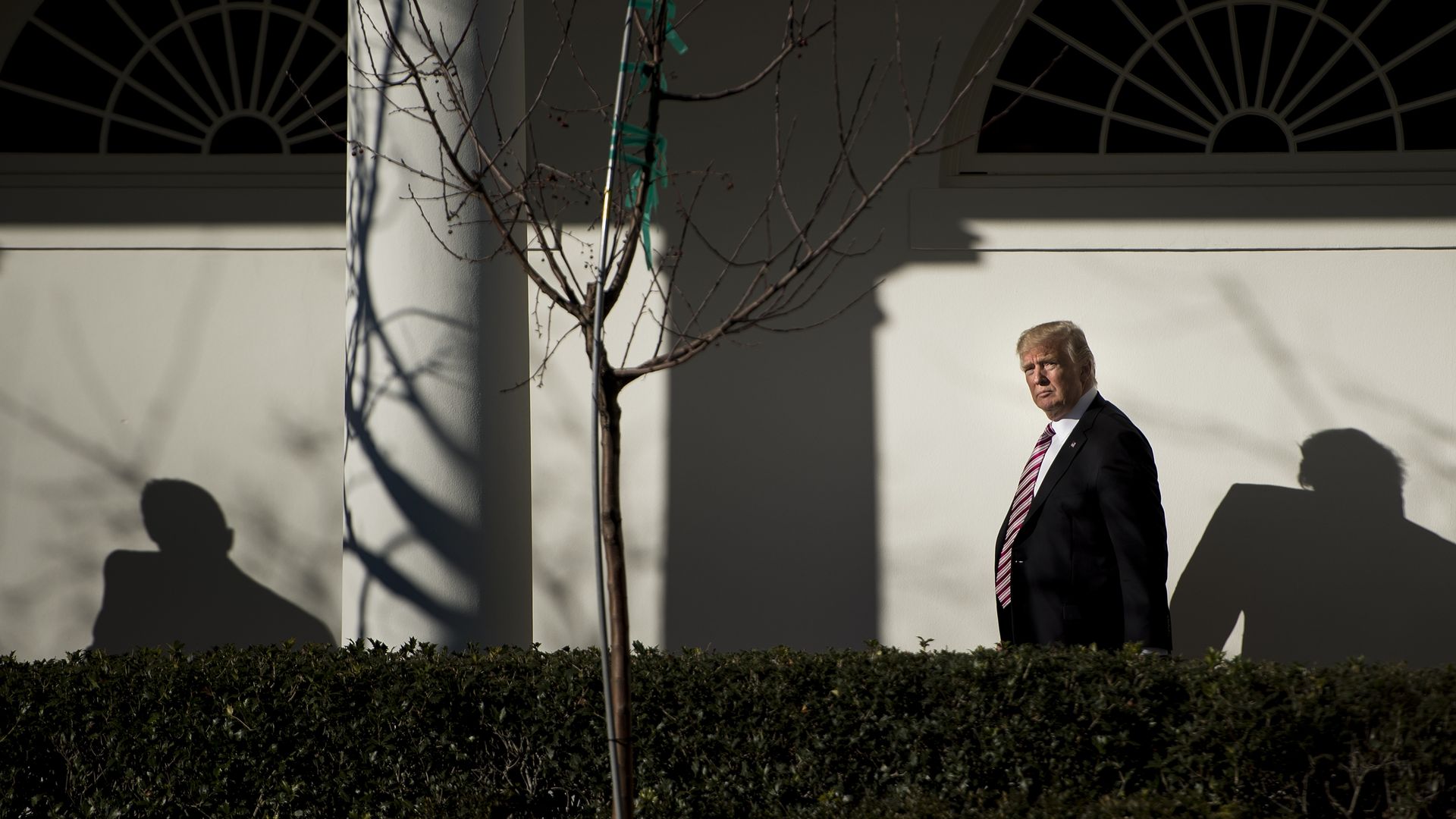 Trump walking outside White House