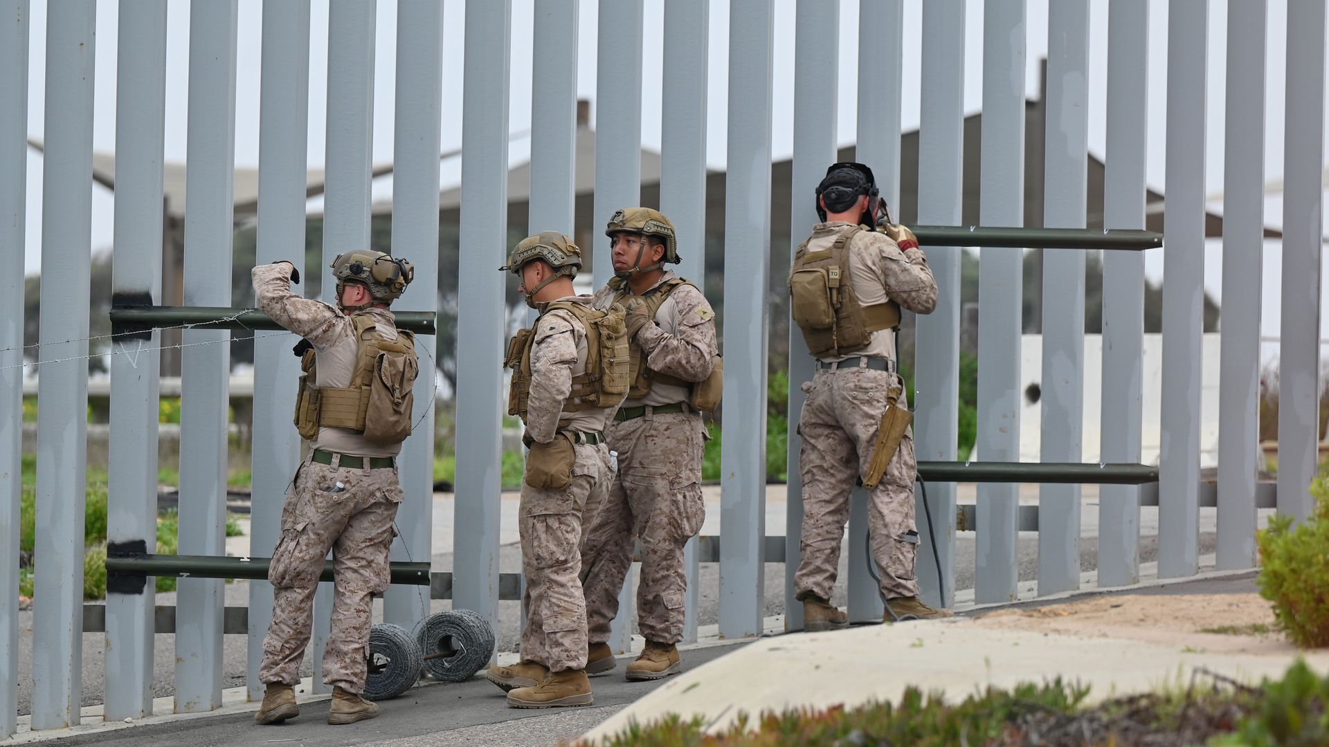 United States Marine Corps troops patrol, weld and install concertina wire along the US-Mexico Tijuana-San Diego beach border area as seen from Playas de Tijuana, Baja California, Mexico, March 25, 2025. 