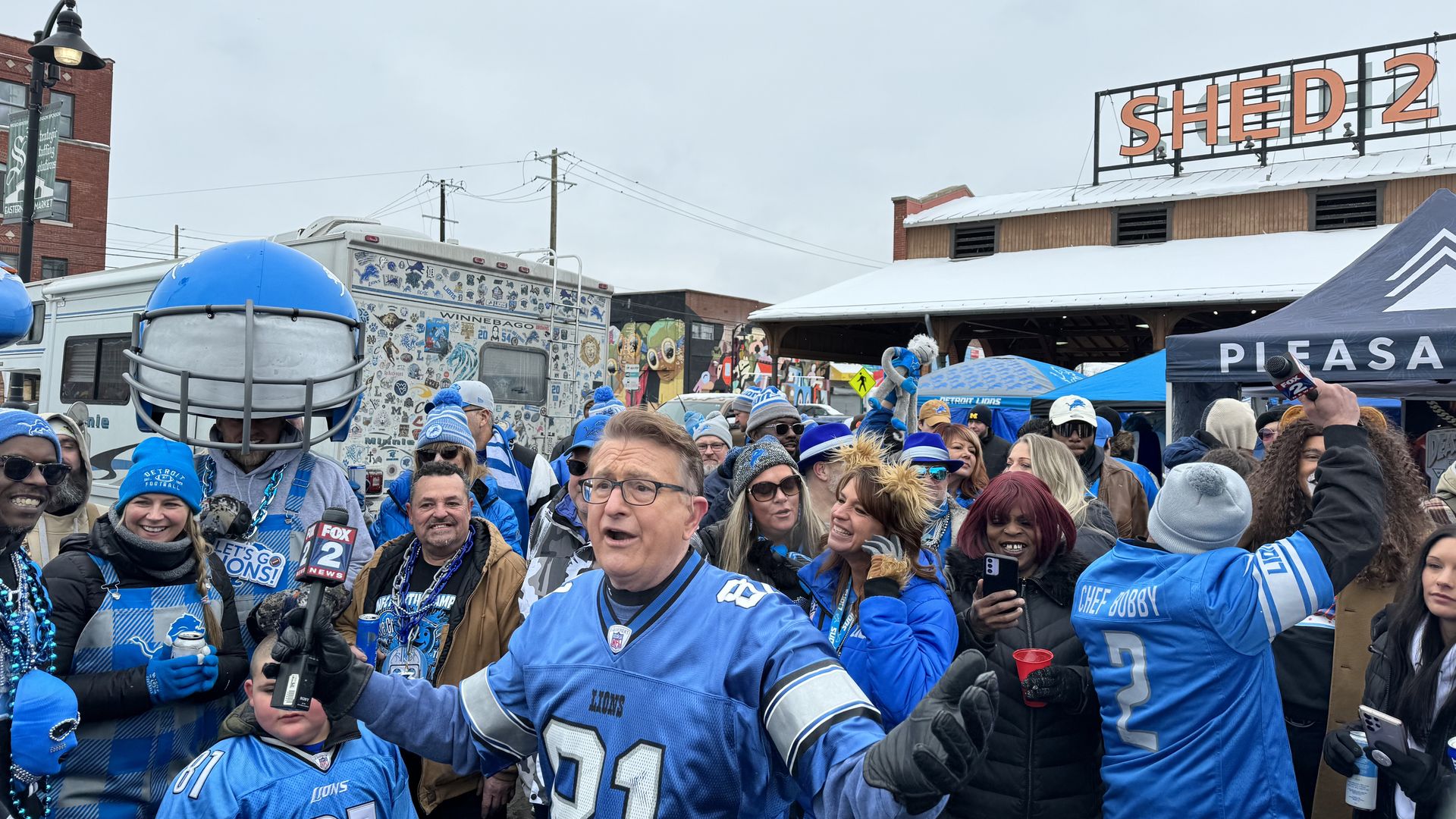 Charlie Langton surrounded by Lions fans