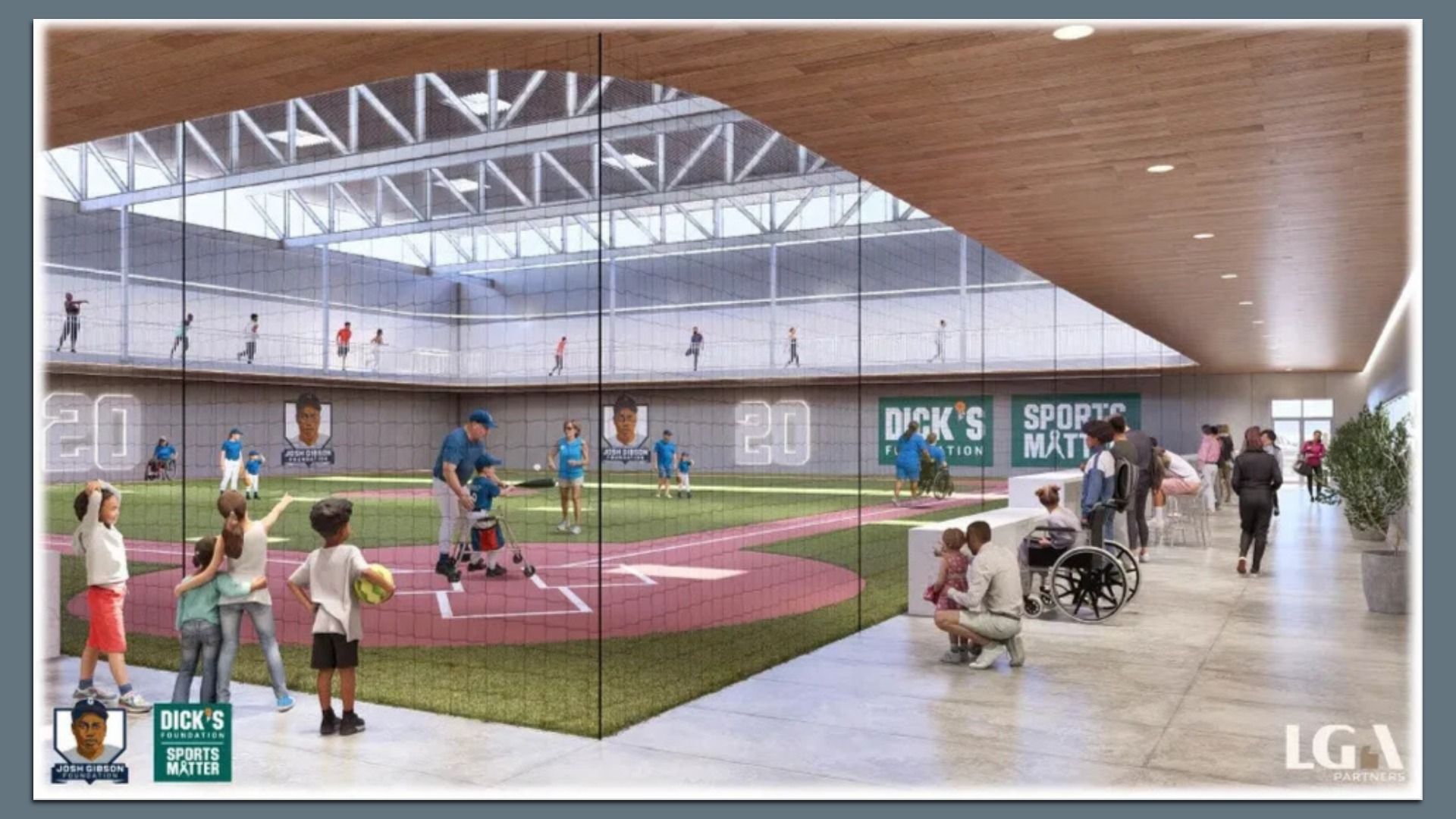 Indoor baseball field with children and adults playing and watching, featuring large glass panels, a wooden ceiling, and banners for "Dick's Foundation" and "Sports Matter."
