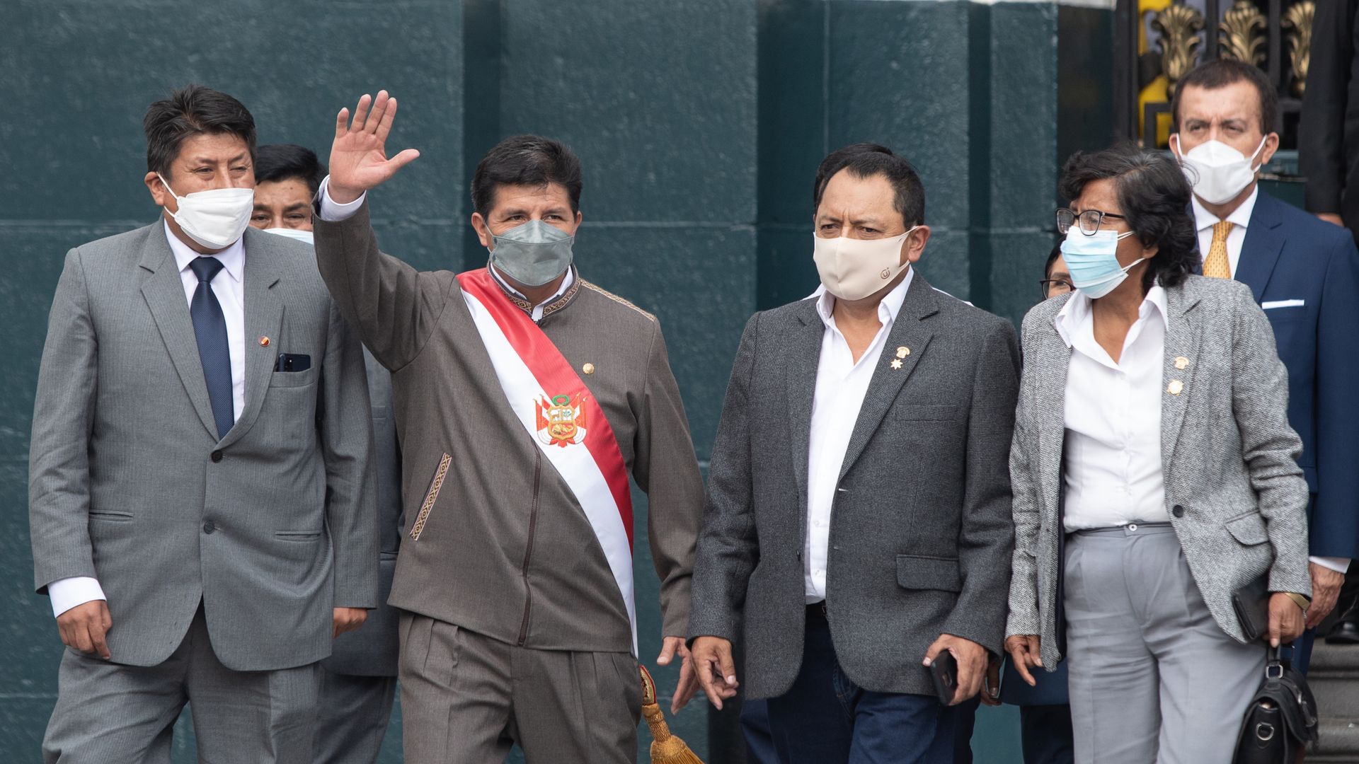 Pedro Castillo, Peru's president, center, leaves for an impeachment hearing at the Congress of the Republic in Lima, Peru, on Monday, March 28.