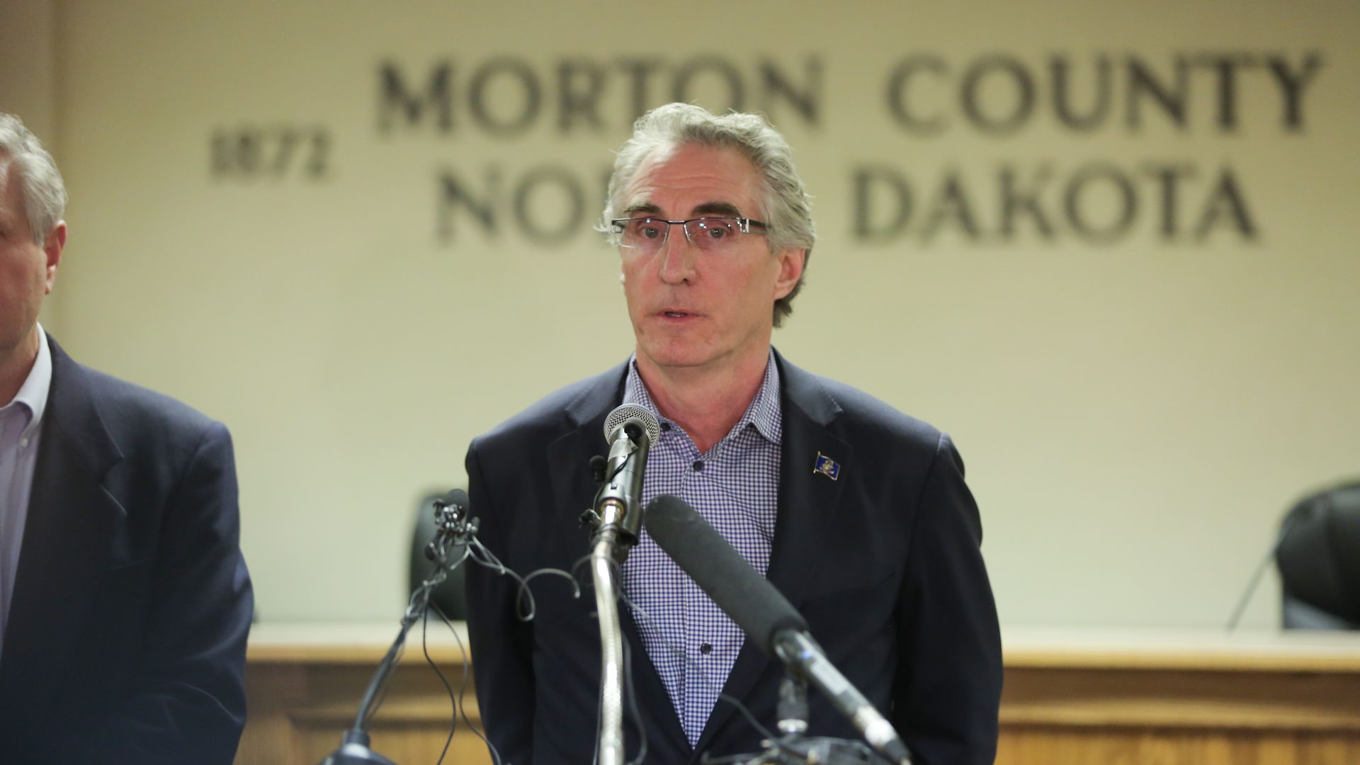 North Dakota Governor Doug Burgum speaks during a press conference announcing plans for the clean up of the Oceti Sakowin protest camp on February 22, 2017 in Mandan, North Dakota