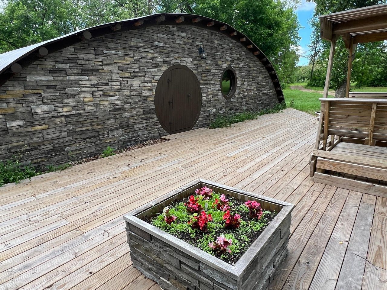 The exterior of a half-circle house.