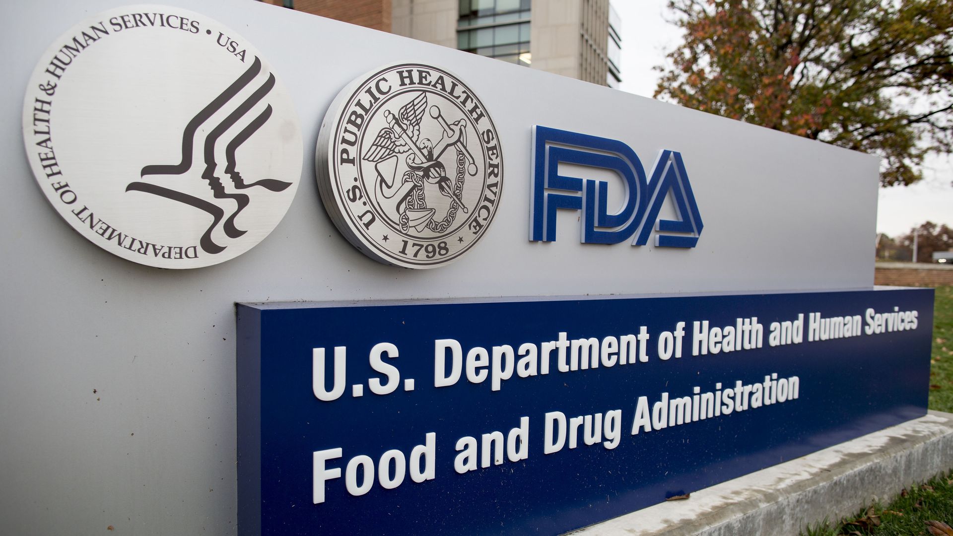 The FDA logo and sign outside of FDA headquarters.