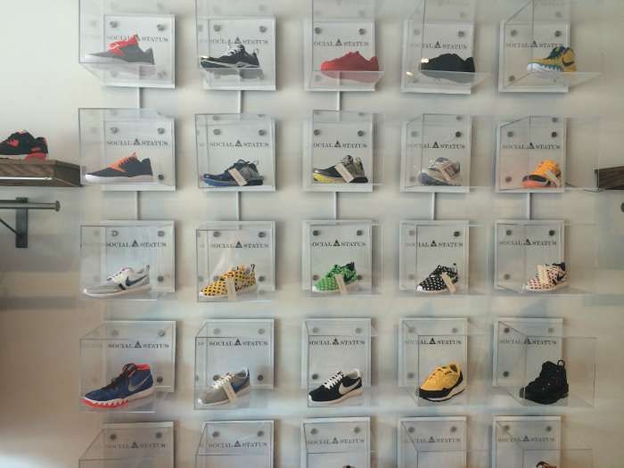 Masked thieves crashed a minivan into Social Status and stole an estimated 7,000 in merchandise