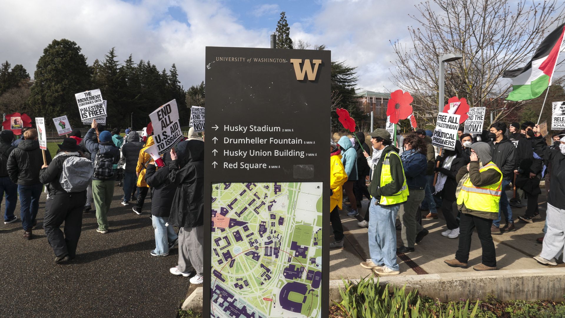  People hold signs as they show support for Palestinians during a "Fight for Our Rights" demonstration by Shut It Down for Palestine (SID4P) and various local groups at the University of Washington campus in Seattle in March.