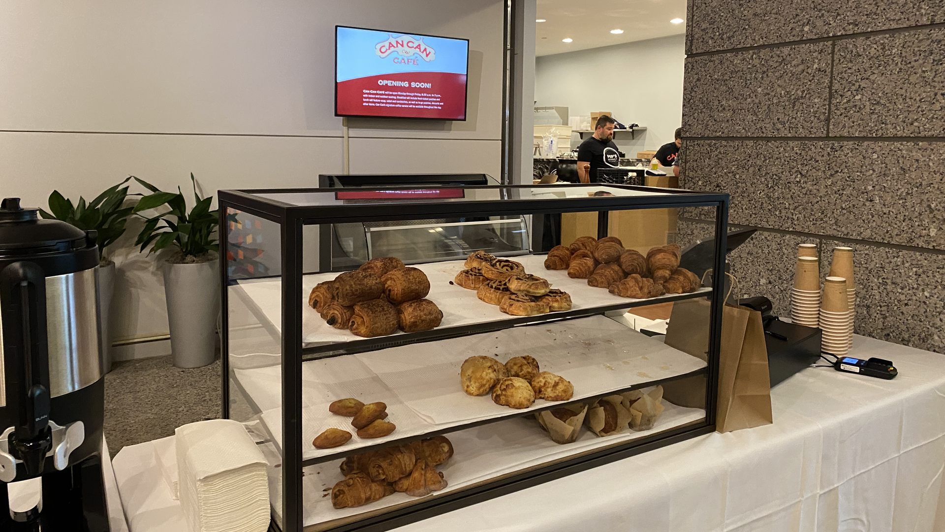 a counter with a pastry tray