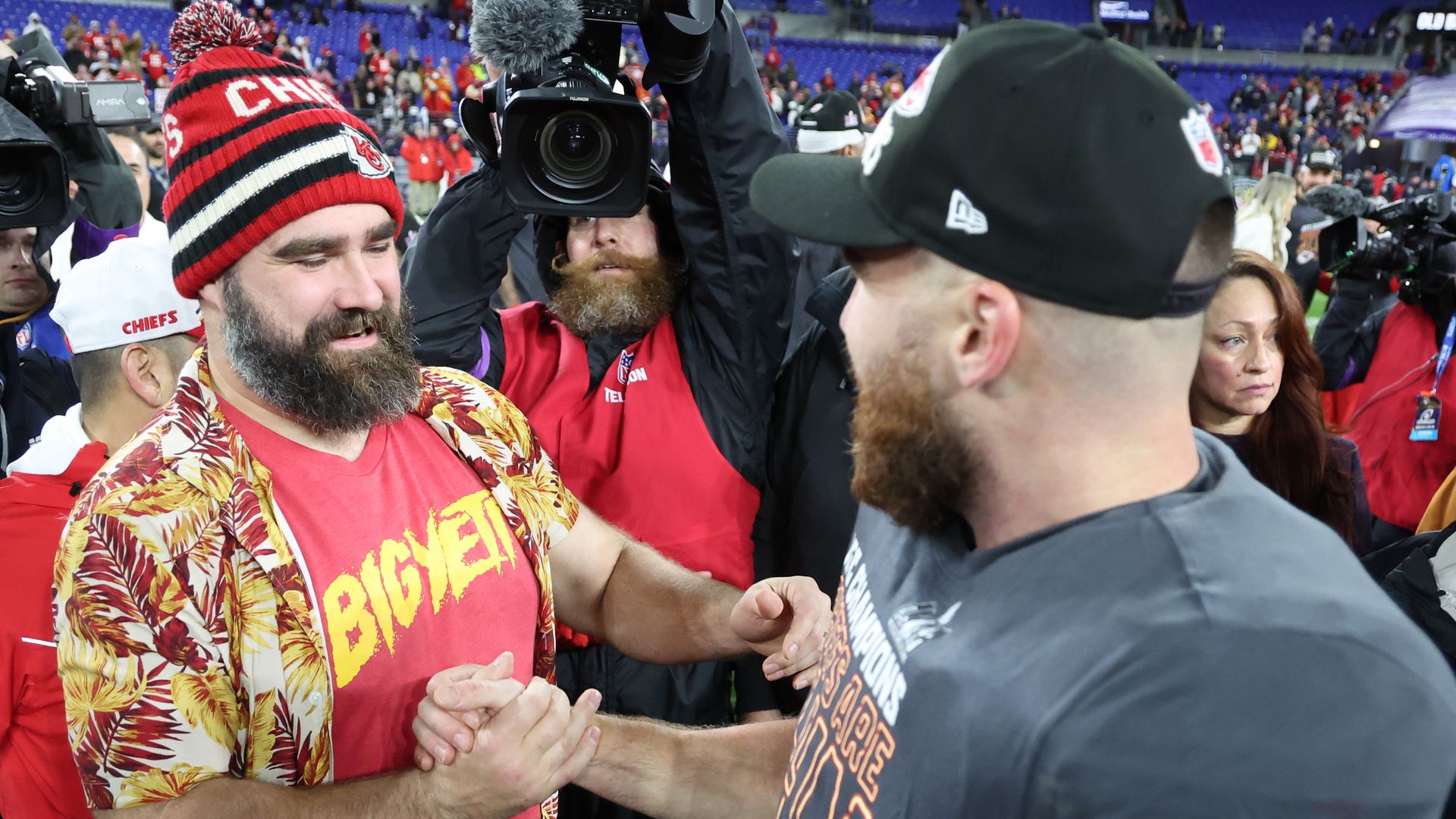 Jason Kelce, left, shakes brother Travis' hand after the Chiefs beat the Baltimore Ravens to advance to the Super Bowl.