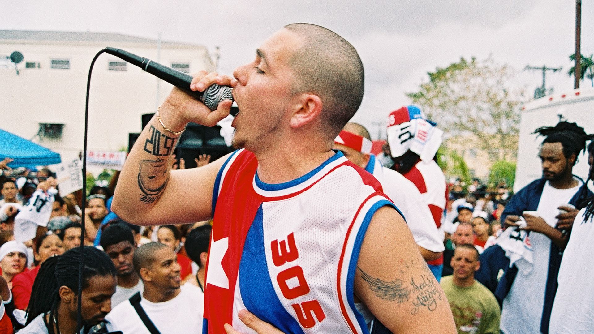 Rapper Pitbull (Armando Perez) filming his video for "Culo" during a performance at the Calle Ocho Festival in Miami, Florida on March 14, 2004. (Photo by Julia Beverly/Getty Images)
