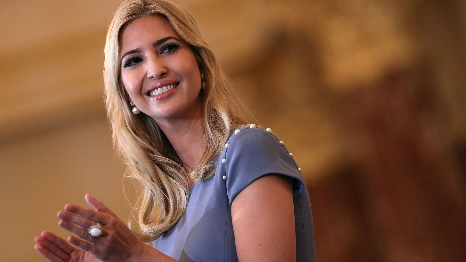 Ivanka trump smiling nad clapping