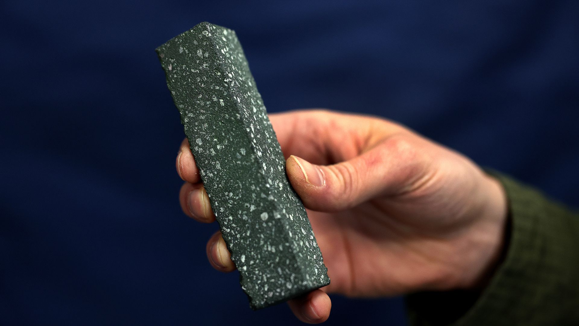 Electrified Thermal Solutions' green-tinted firebrick, with whitish dots. 