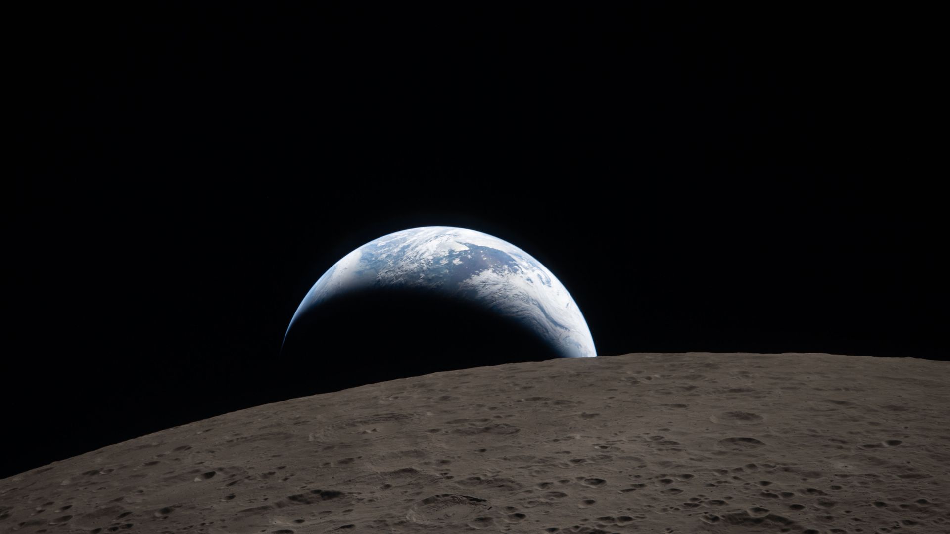 an aerial view of earth and moon