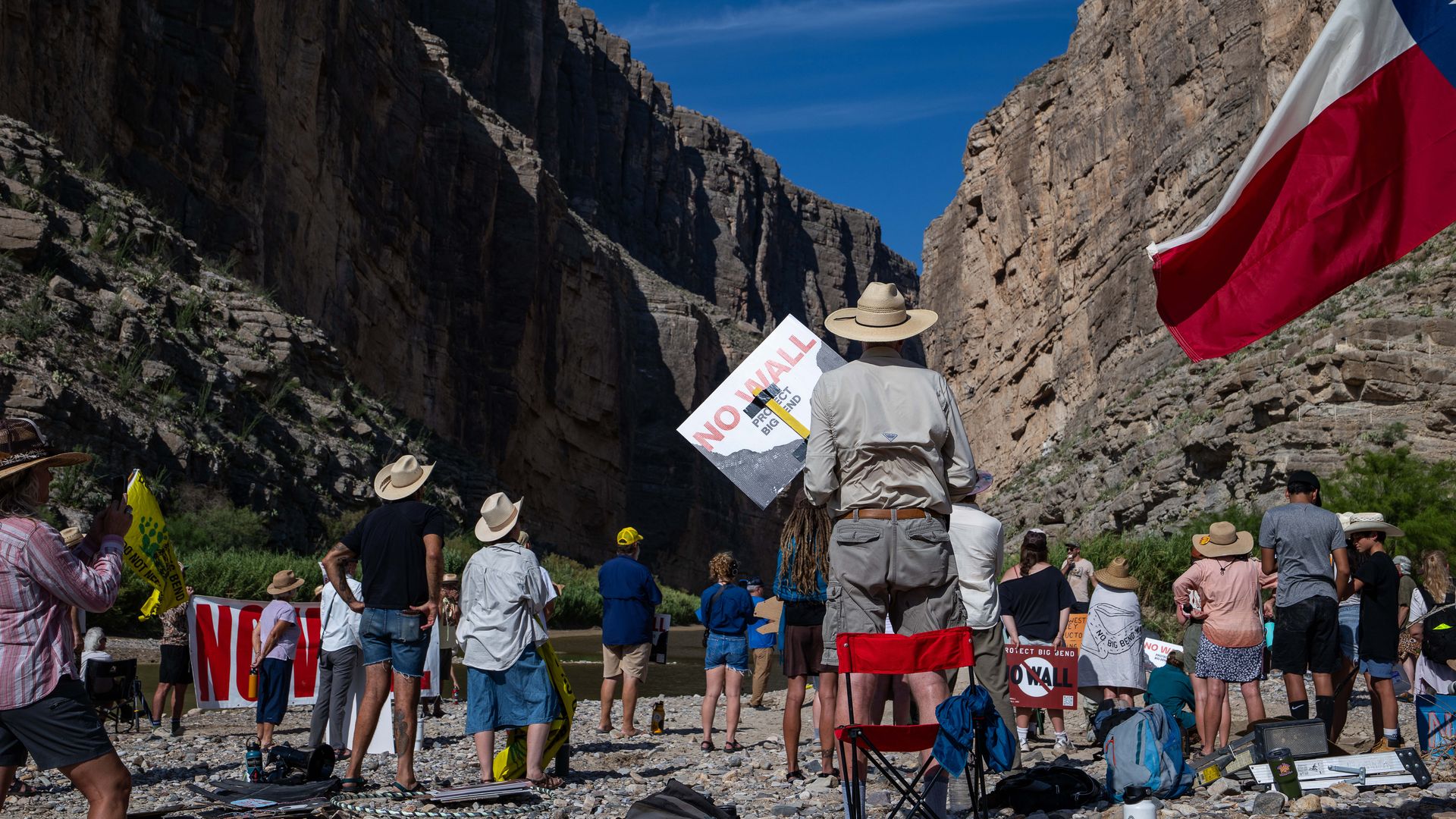 Demonstrators against the construction of a section of the US-Mexico border wall during a protest at Santa Elena Canyon in Big Bend National Park, Texas, US, on Wednesday, Aug. 12, 2026.