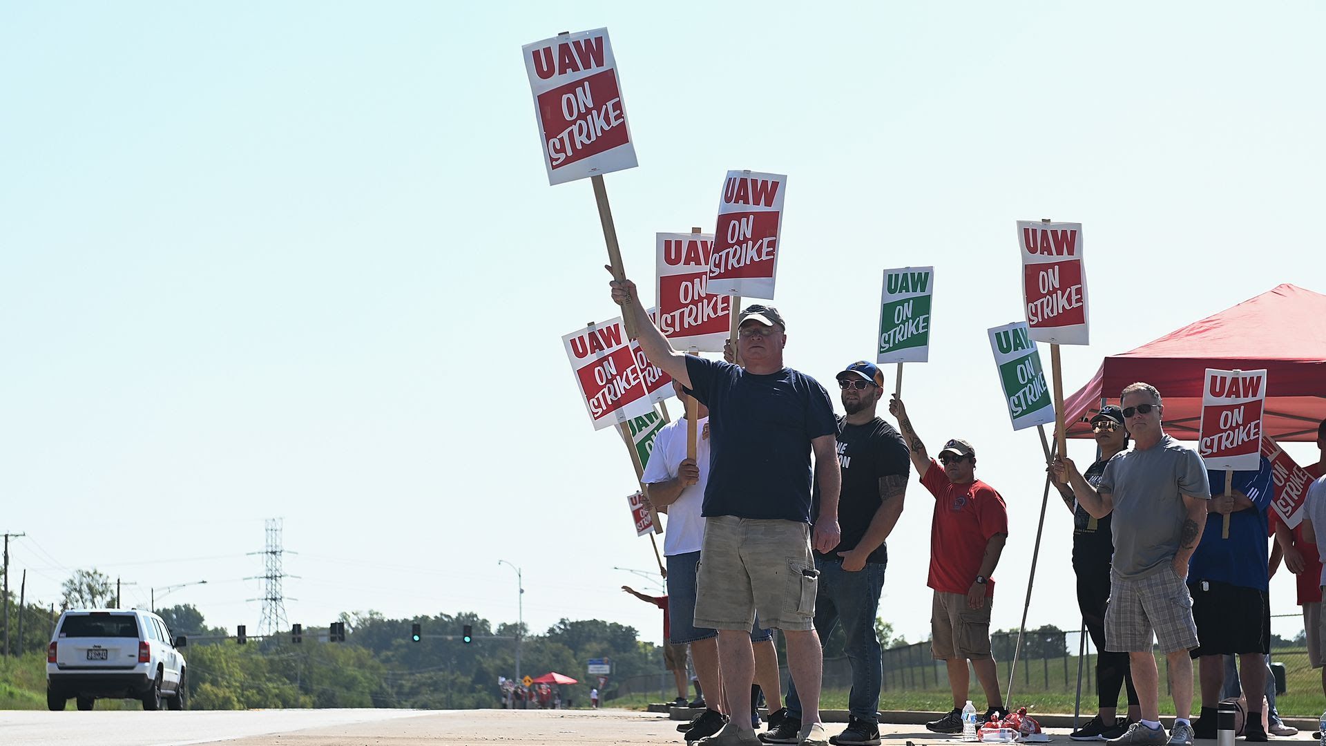 Members of the United Auto Workers Union picket outside the General Motors Assembly Plant 