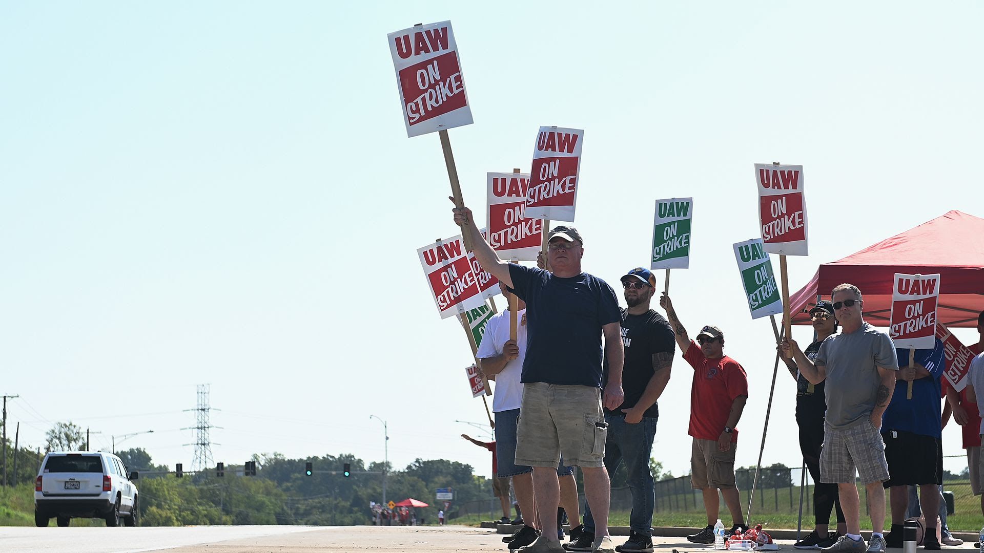 Members of the United Auto Workers Union picket outside the General Motors Assembly Plant