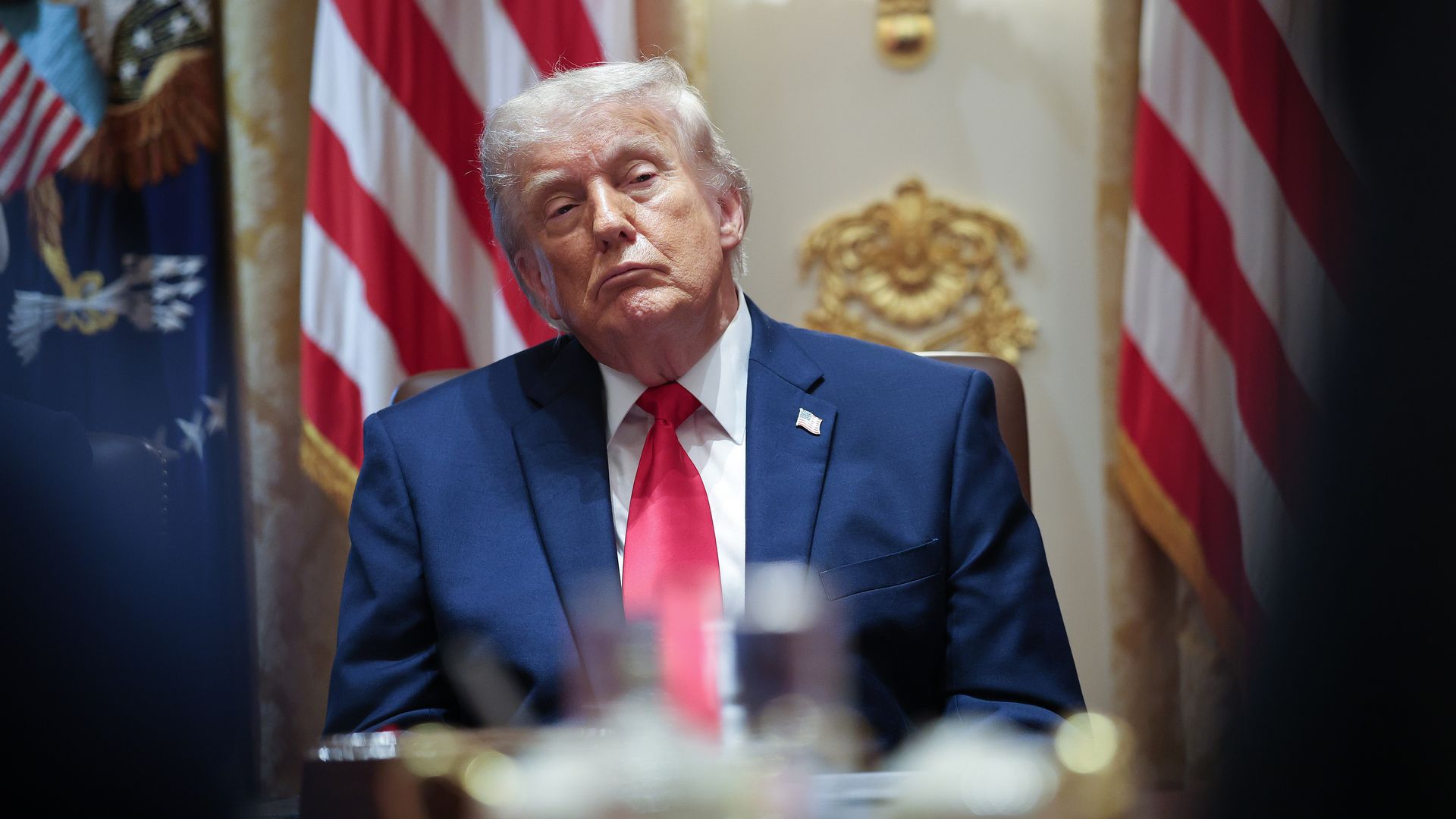 President Donald Trump sits in the Cabinet Room at the White House during a Cabinet meeting in Washington, D.C., on May 27, 2026, listening as members of his administration speak.