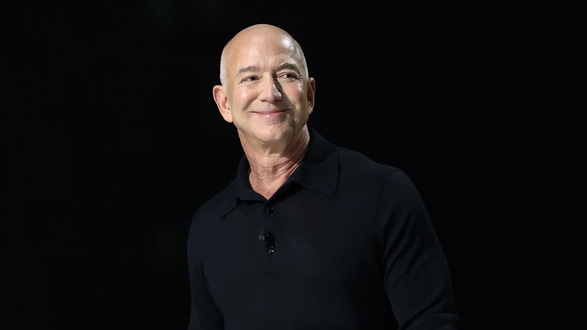  Jeff Bezos, founder and executive chairman of Amazon and owner of the Washington Post, takes the stage during the New York Times annual DealBook summit at Jazz at Lincoln Center on December 04, 2024 in New York City. 