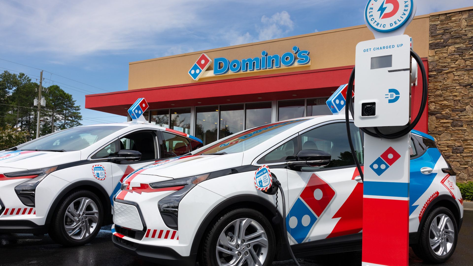 Photos of Domino's electric delivery vehicles