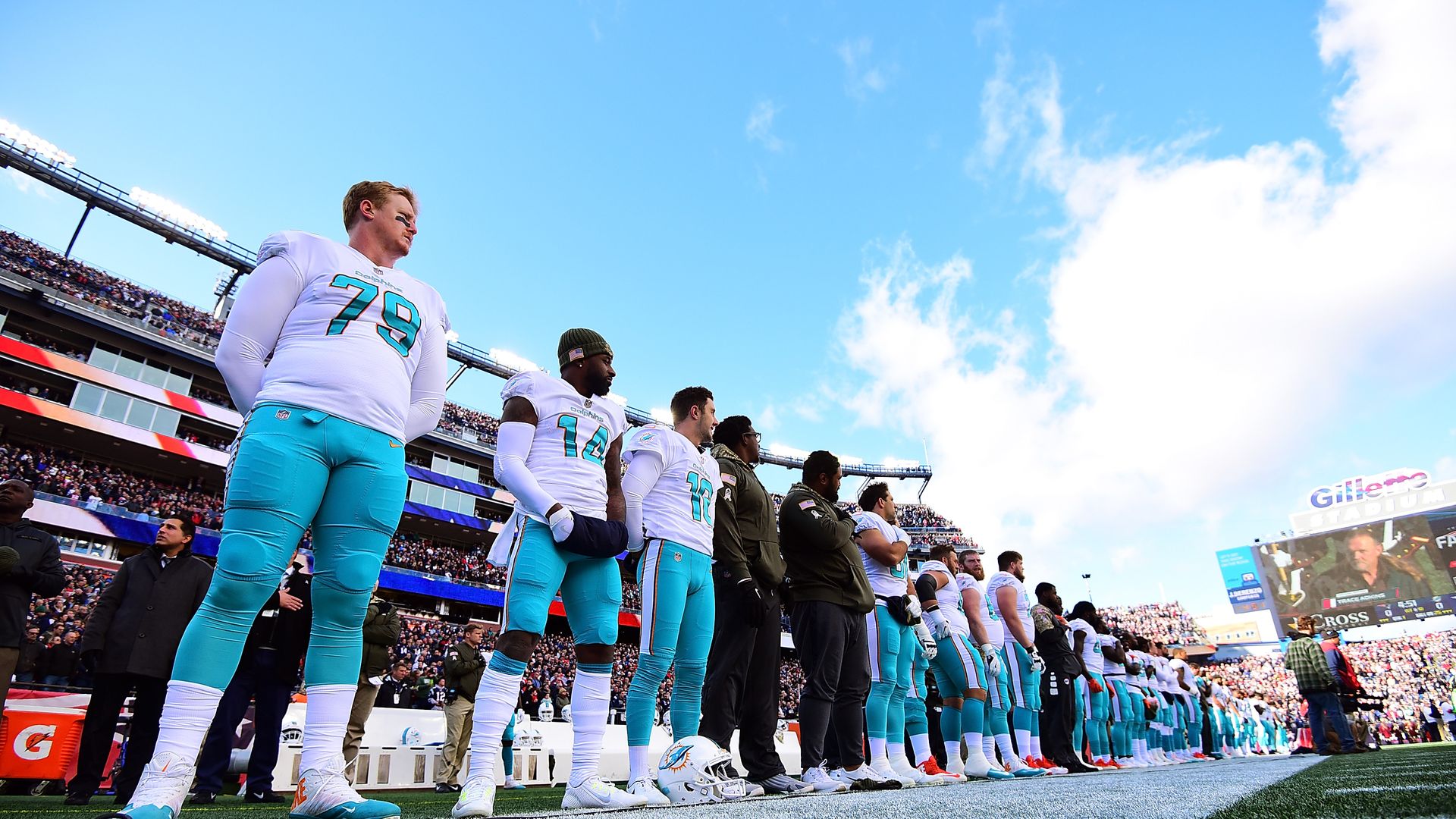 Miami Dolphins players on the sideline