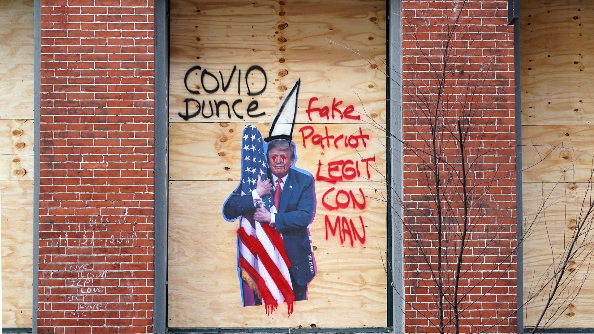 A store with Trump graffiti in Soho on November 2, 2020. 