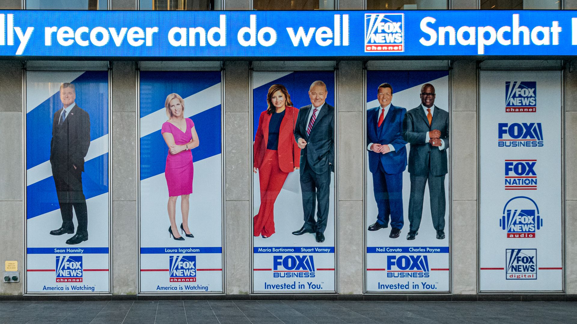 Portraits of news anchors are seen at Fox News headquarters in New York City in June 2021.