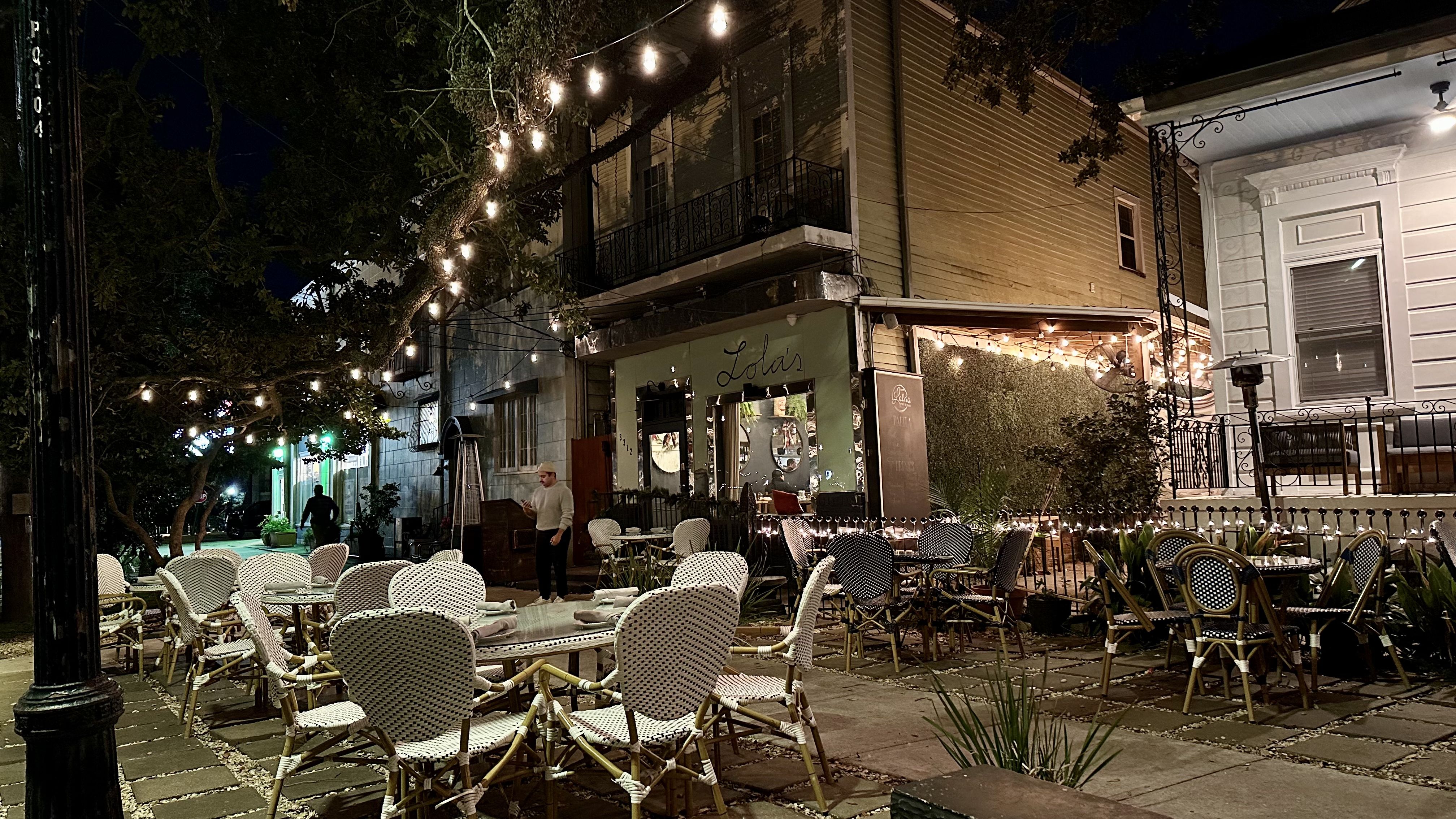 Photos shows outdoor tables at Lola's in New Orlean.