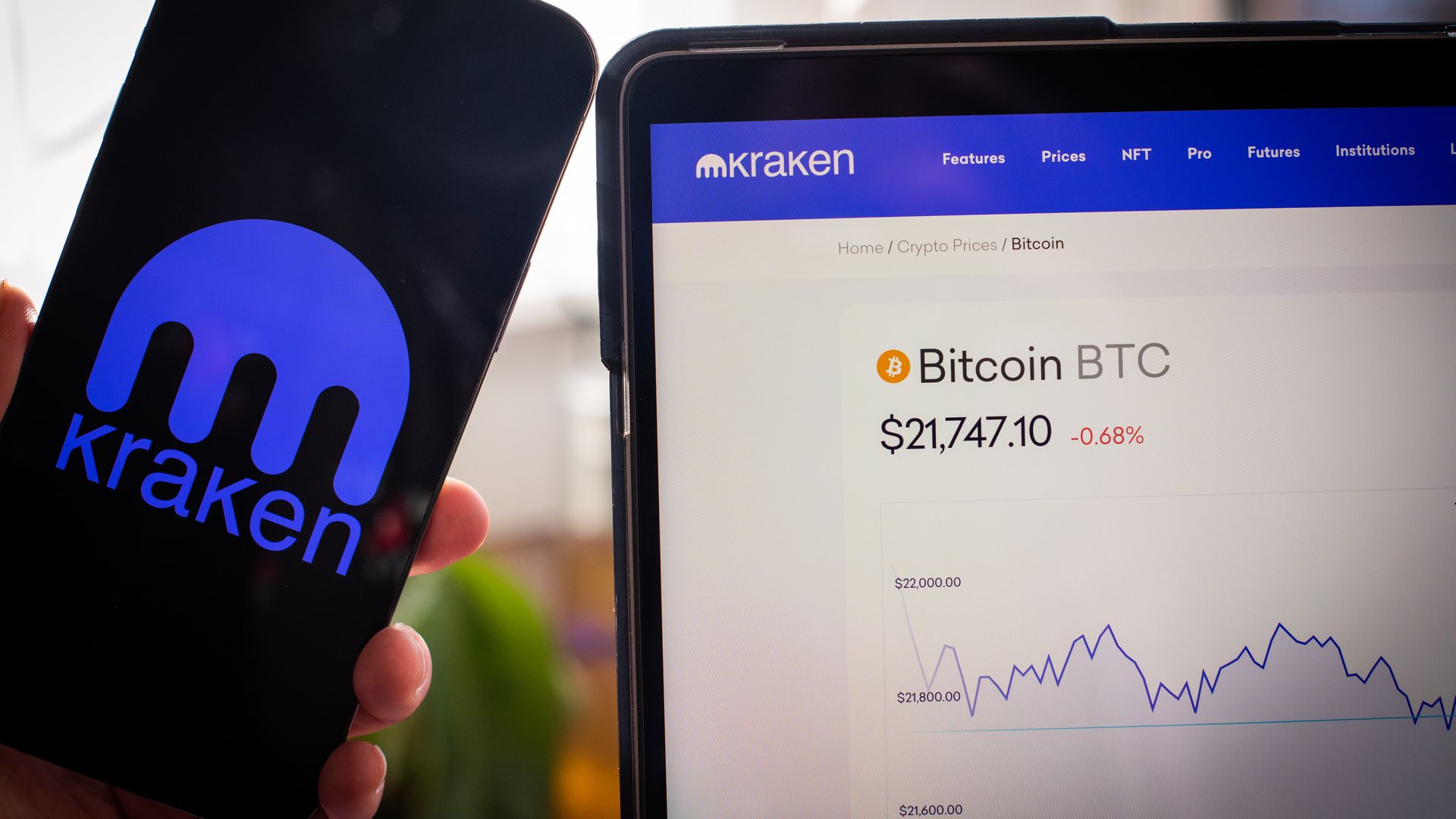 An image of the Kraken app on both mobile and desktop.