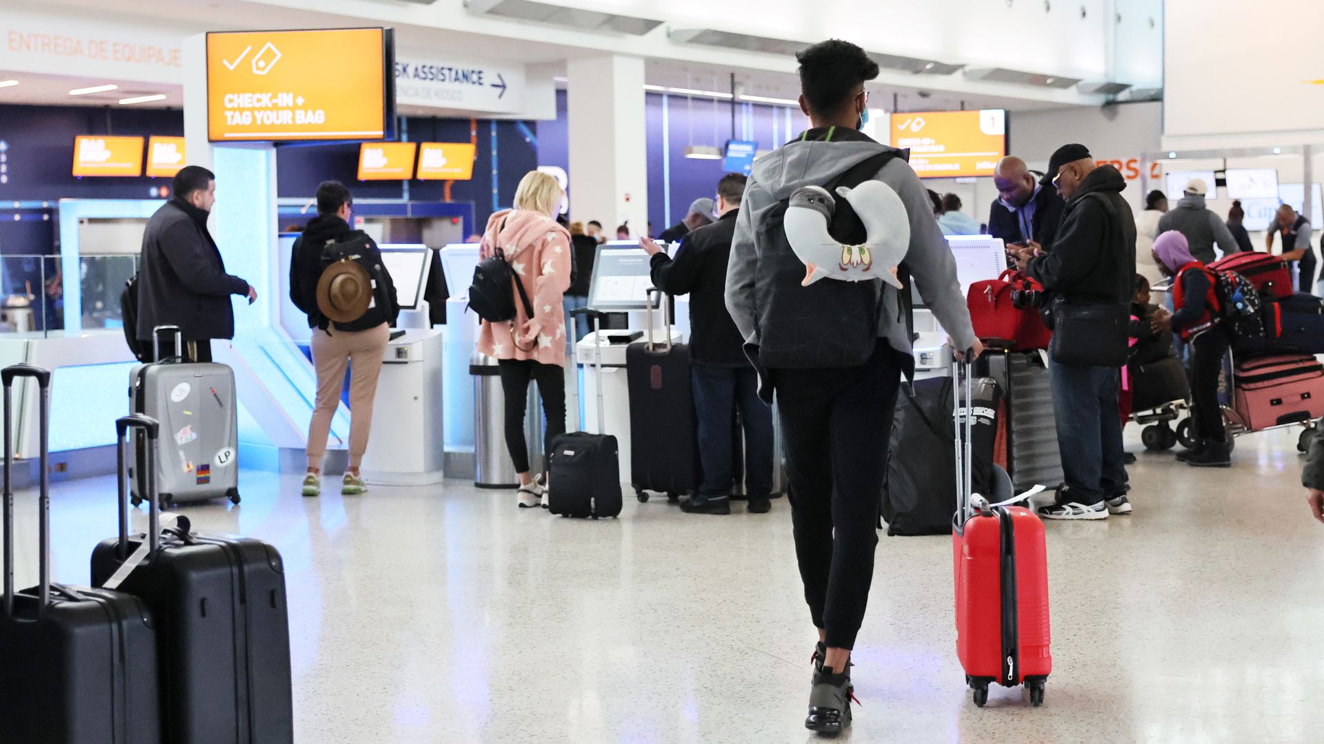 People check-in for their flight at JFK airport on January 11, 2023 in New York City.