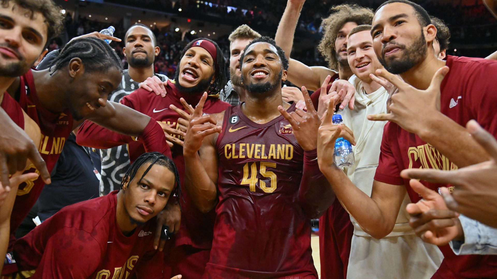 Donovan Mitchell of the Cleveland Cavaliers celebrates after a game with his teammates. 