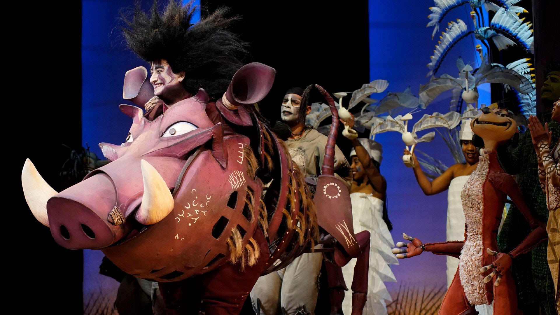 Actors in a touring production of "The Lion King" on stage at TPAC. 