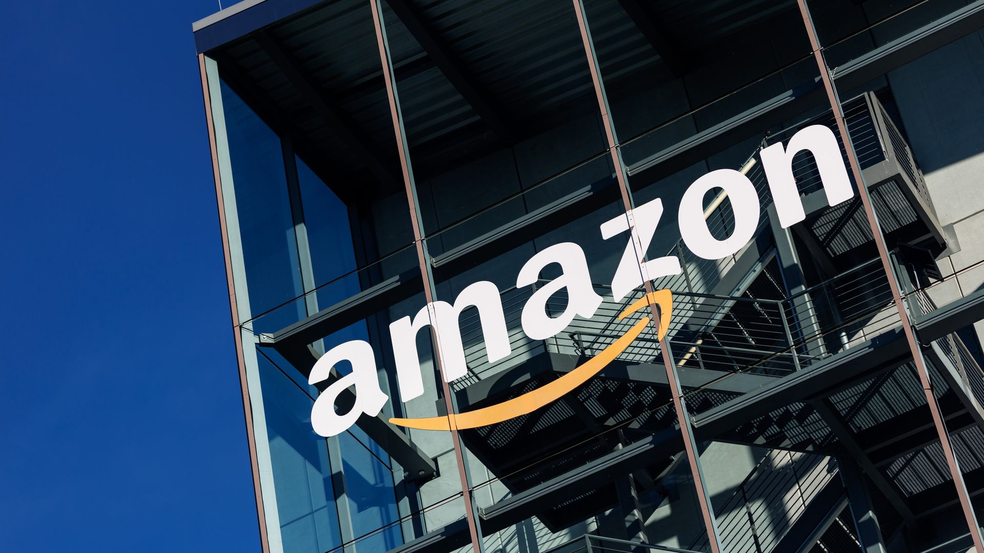 Amazon's logo on the side of an office building. 