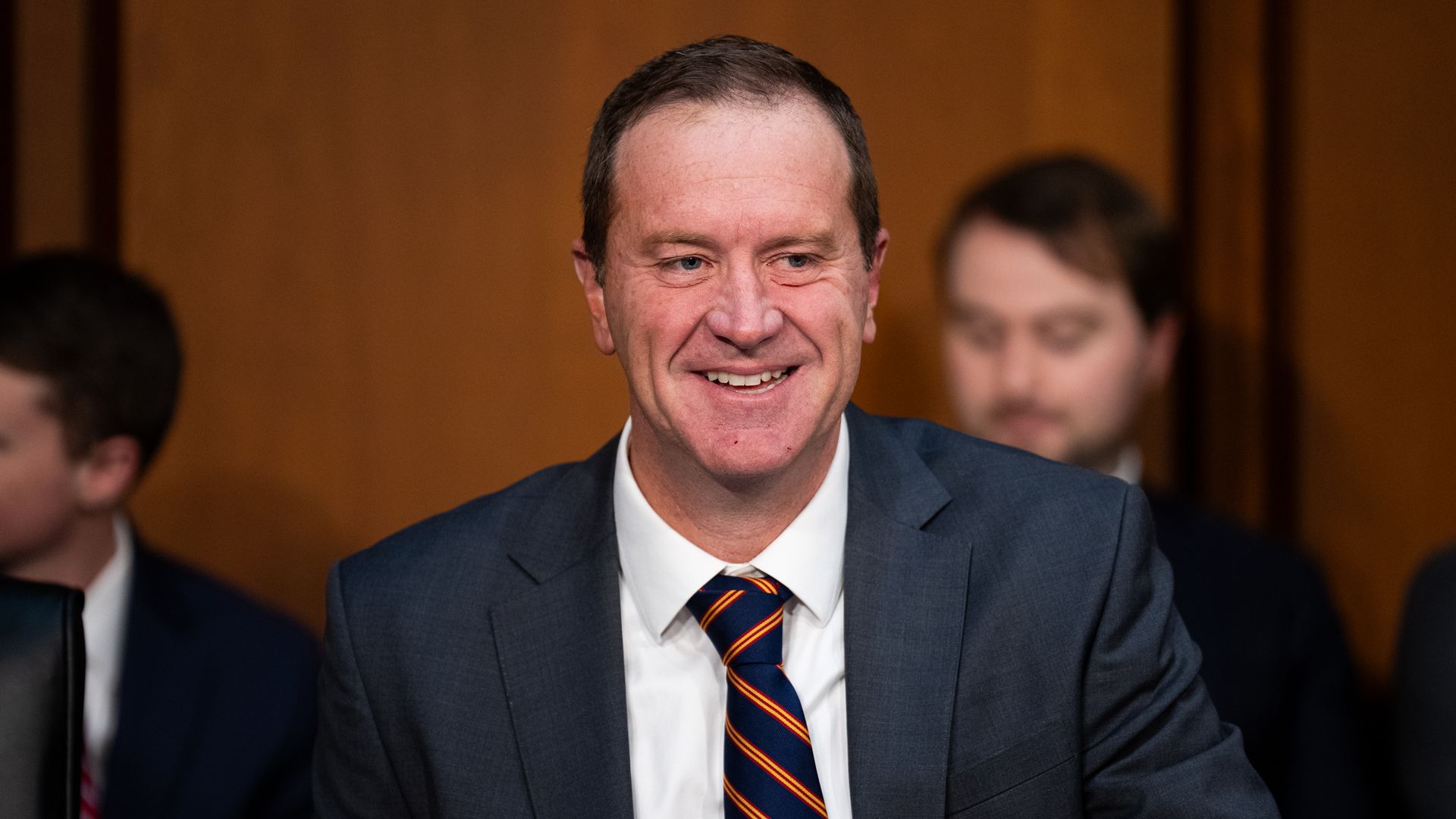 Sen. Eric Schmitt smiles during the confirmation hearing of Pam Bondi (not pictured).
