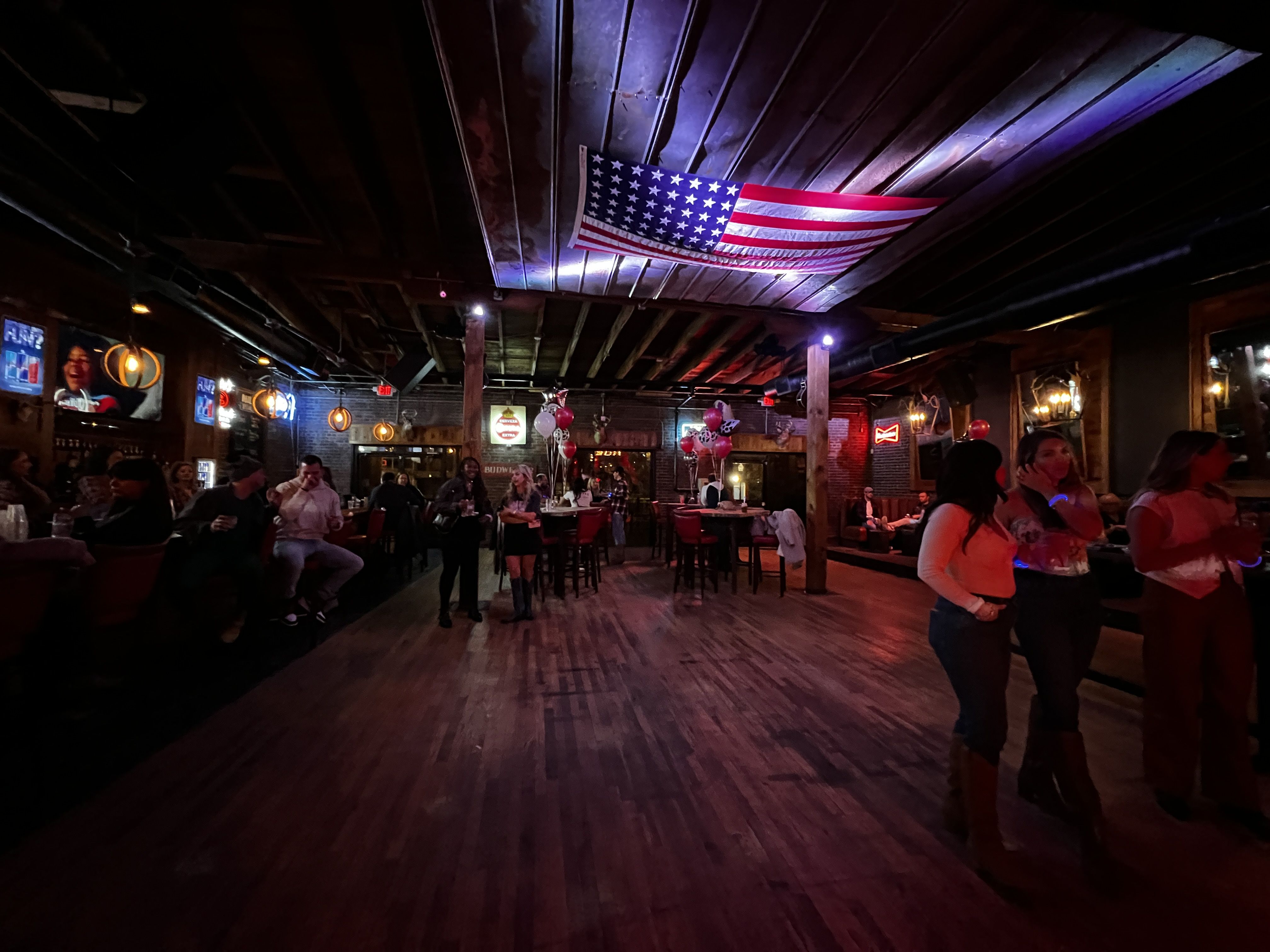 bar with an american flag on the ceiling