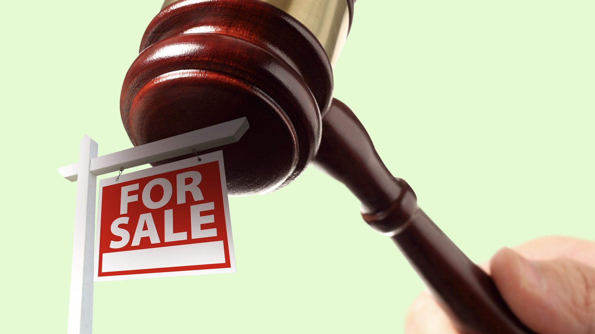 Illustration of a large gavel hovering over a small for sale yard sign