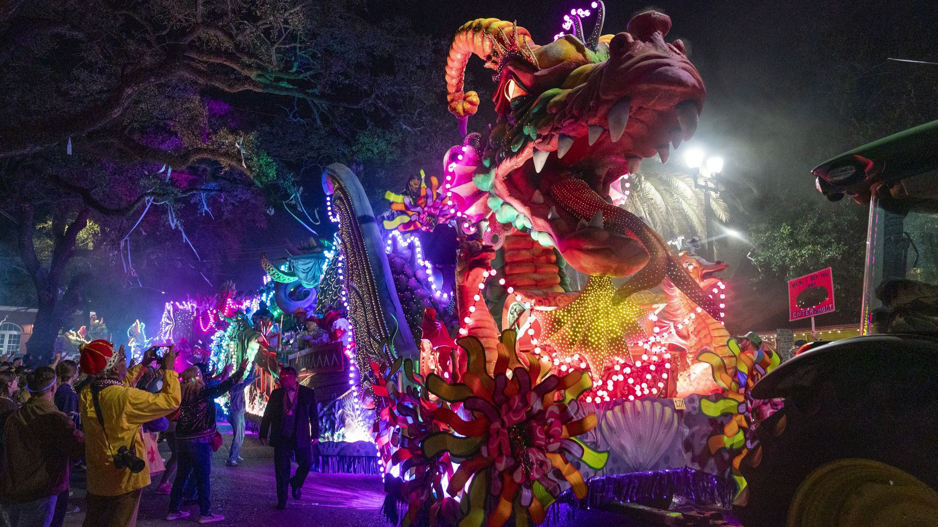 Image shows a dragon Mardi Gras float.