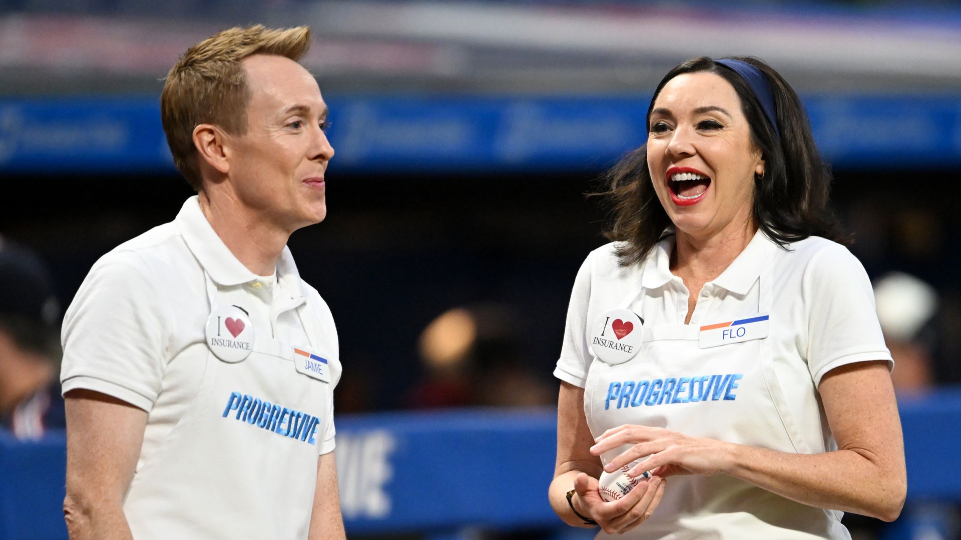 White man and women in white Progressive insurance aprons 