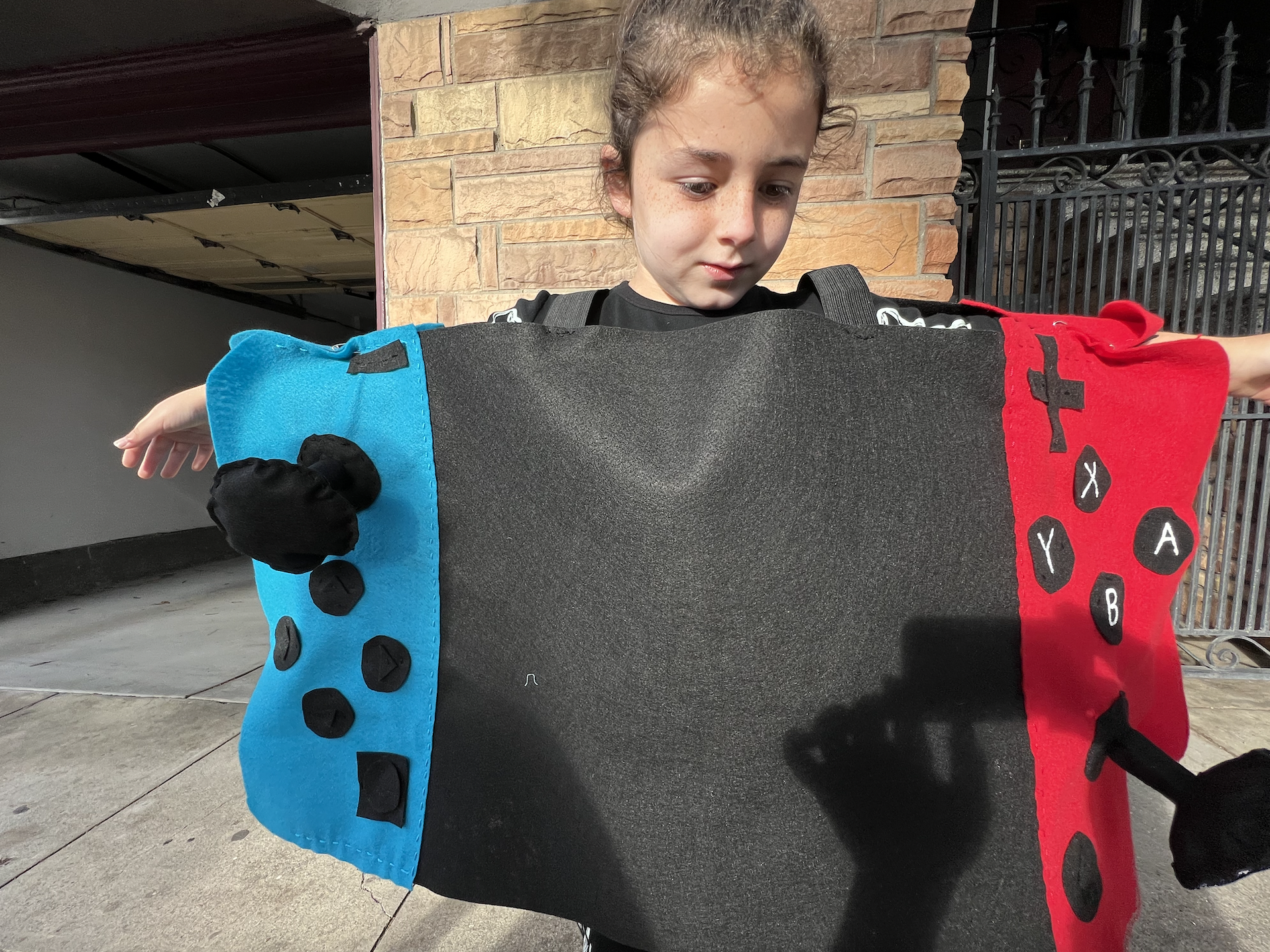 A reporter's kid dressed as a Nintendo Switch for Halloween